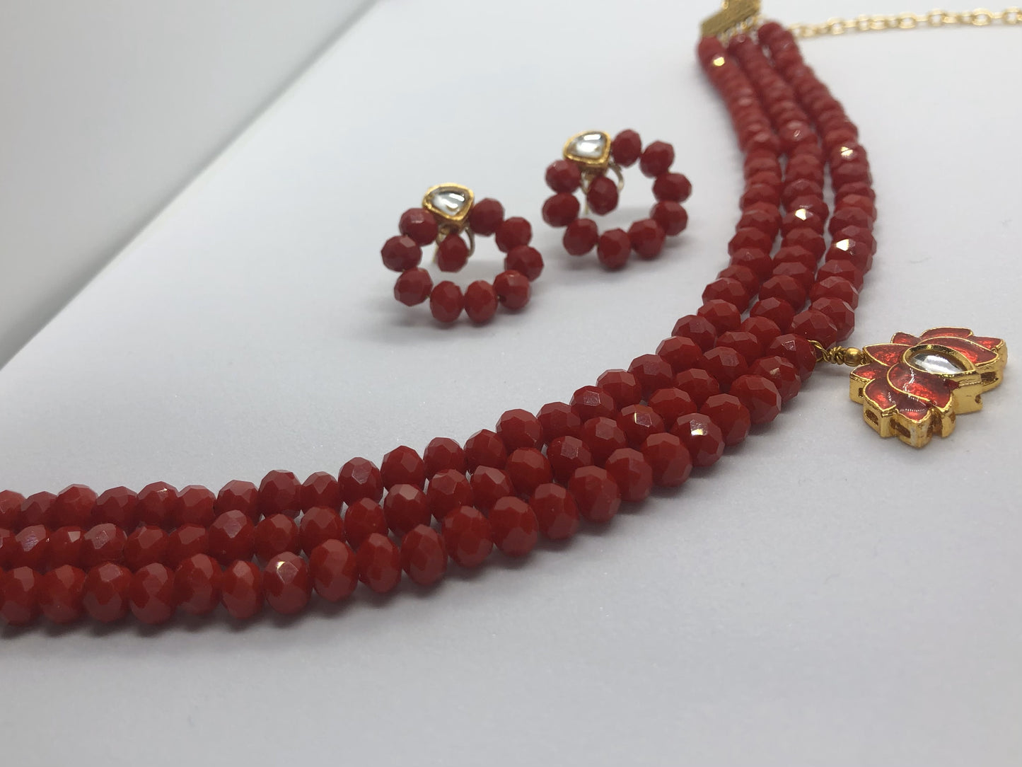 Elegant Red Glass Bead Choker with Lotus Pendant and Round Earrings